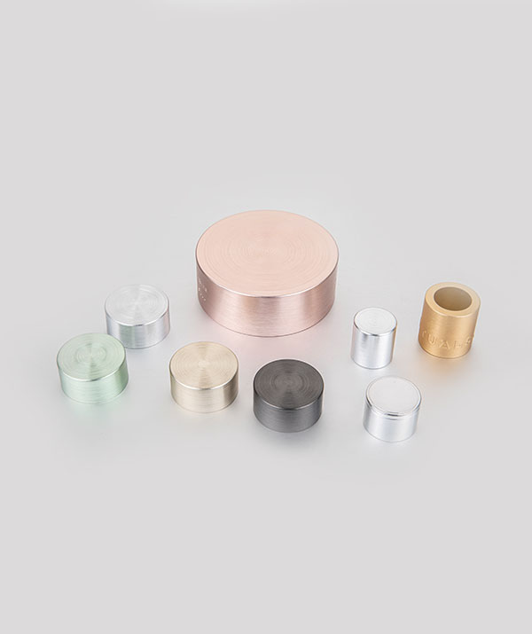 What are the features and benefits of aluminum disc top caps